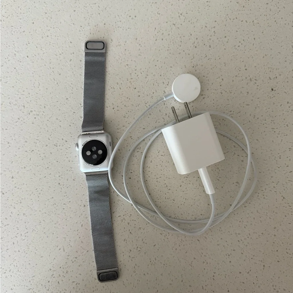 Apple series 3 silver watch with Charging Cable - S/M Stainless Band